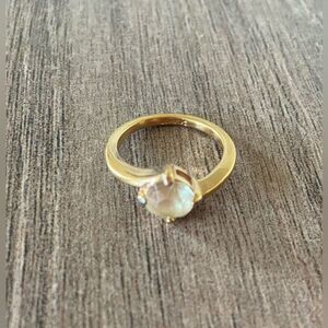 Vintage Avon stamped women’s size 10.5 gold color and light yellow stone ring